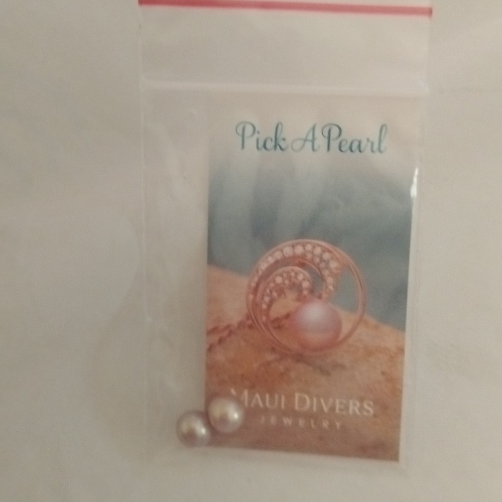 Two unset pearls